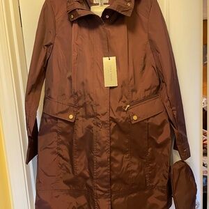 Ladies packable water resistant rain jacket